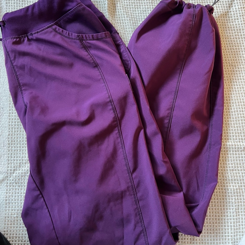 Purple infinity scrub pants. Size medium.
